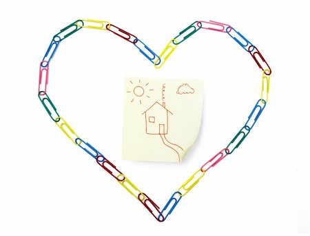 Symbolic sticky note with home inside the heart made of paper clips Stock Photo - Budget Royalty-Free & Subscription, Code: 400-05113201