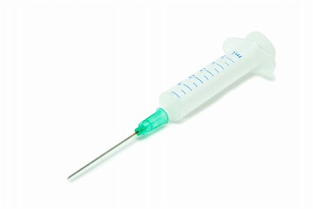 simsearch:400-05946838,k - New syringe isolated on white background. Foto de stock - Super Valor sin royalties y Suscripción, Código: 400-05113290