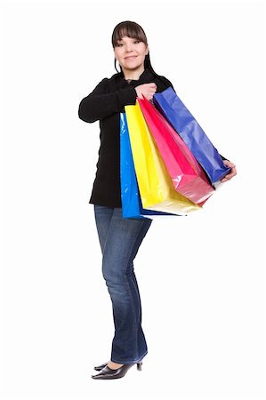 simsearch:400-04377587,k - attractive brunette woman with shopping bags Photographie de stock - Aubaine LD & Abonnement, Code: 400-05113332