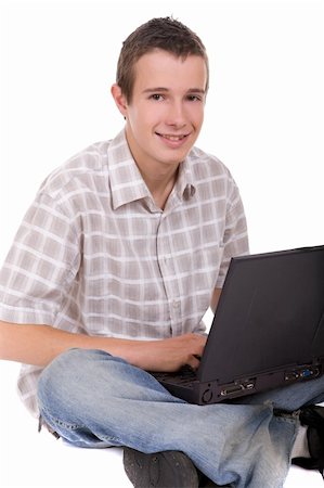 simsearch:400-04704759,k - casual teenager with laptop. over white background Stock Photo - Budget Royalty-Free & Subscription, Code: 400-05113375