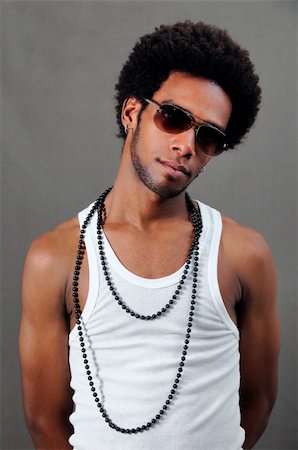 simsearch:400-05080882,k - Portrait of young trendy african man posing Photographie de stock - Aubaine LD & Abonnement, Code: 400-05113733