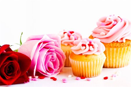 pink cupcake flowers - Valentines day roses and cupcakes with pink icing Stock Photo - Budget Royalty-Free & Subscription, Code: 400-05113944