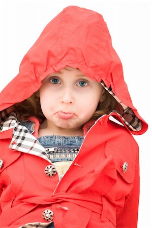 Upset little girl dressed with a red coat. Stock Photo - Budget Royalty-Free & Subscription, Code: 400-05124032