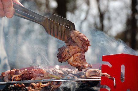 spoon taking a slice of grilled meat Stock Photo - Budget Royalty-Free & Subscription, Code: 400-05125128
