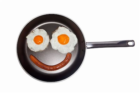 eggs with face - Saucepan with eggs and sausage Stock Photo - Budget Royalty-Free & Subscription, Code: 400-05125438