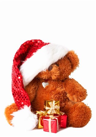 simsearch:400-04717437,k - Stack of colorful Christmas gifts and Santa bear wearing a shiny hat, isolated on white background Fotografie stock - Microstock e Abbonamento, Codice: 400-05125597