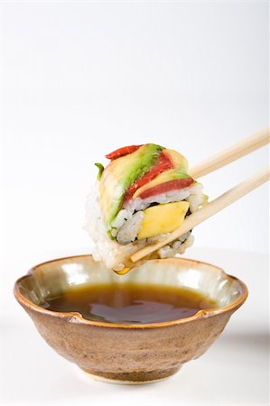 simsearch:400-05119569,k - sushi dipping in vinegar Stock Photo - Budget Royalty-Free & Subscription, Code: 400-05126317