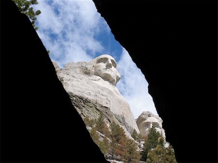 Mt. Rushmore through the rocks on a beautiful day in the summer of 2005 Stock Photo - Budget Royalty-Free & Subscription, Code: 400-05126688
