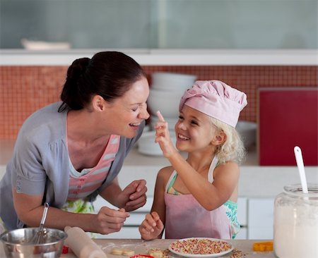 Portrait of Mother and Daugther having fun together in Kitchen Stock Photo - Budget Royalty-Free & Subscription, Code: 400-05126759
