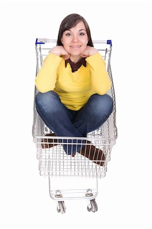 happy brunette woman with shopping cart. over white background Stock Photo - Budget Royalty-Free & Subscription, Code: 400-05126794