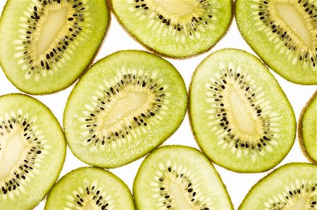 Pattern of kiwi slices isolated on white Stock Photo - Budget Royalty-Free & Subscription, Code: 400-05126977
