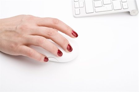 Fingers with red nail holding a mouse Stock Photo - Budget Royalty-Free & Subscription, Code: 400-05126970