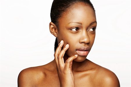 pedi - African woman with natural make-up headshoot Photographie de stock - Aubaine LD & Abonnement, Code: 400-05127481