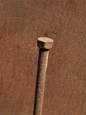 simsearch:400-08156181,k - Rusty bolt against a rusty metal wall Foto de stock - Super Valor sin royalties y Suscripción, Código: 400-05128545