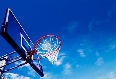 Red New Basket Ball Net Under Beautiful Blue Sky Stock Photo - Budget Royalty-Free & Subscription, Code: 400-05128600