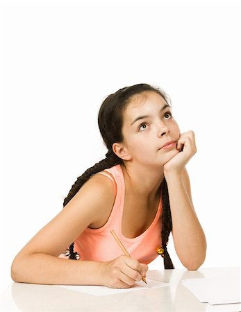 simsearch:400-06517383,k - Teenager girl  with plaits  sitting at a table Fotografie stock - Microstock e Abbonamento, Codice: 400-05128834