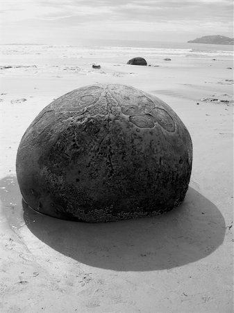 simsearch:400-08888052,k - Shadow over Moeraki Boulder in New Zealand Stock Photo - Budget Royalty-Free & Subscription, Code: 400-05128915