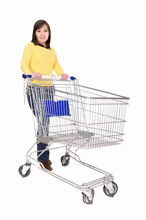 attractive brunette woman with shopping cart. over white background Stock Photo - Budget Royalty-Free & Subscription, Code: 400-05129034