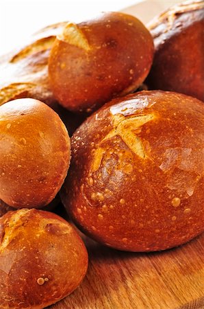 sour dough bread - Small and large round loaves of sourdough bread Stock Photo - Budget Royalty-Free & Subscription, Code: 400-05129931