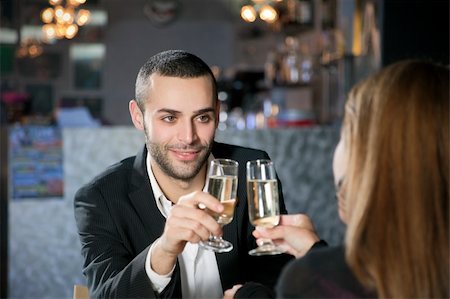 mid adult couple toasting in restaurant. Copy space Stock Photo - Budget Royalty-Free & Subscription, Code: 400-05121168