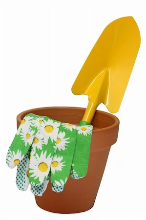 simsearch:400-08252596,k - Flower pot with garden shovel isolated on white background Photographie de stock - Aubaine LD & Abonnement, Code: 400-05121604