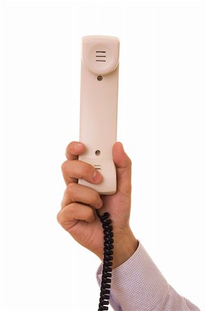 simsearch:400-07516047,k - Hand holding phone receiver isolated on white Stockbilder - Microstock & Abonnement, Bildnummer: 400-05122831