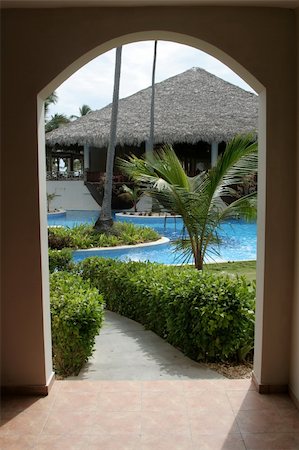 punta cana - A tropical resort through the view of an archway. Stock Photo - Budget Royalty-Free & Subscription, Code: 400-05123726