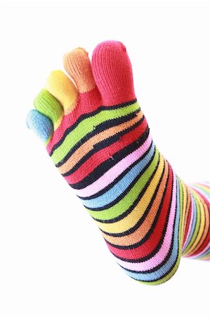 simsearch:400-04895941,k - woman legs in strip sock on white background Fotografie stock - Microstock e Abbonamento, Codice: 400-05134192
