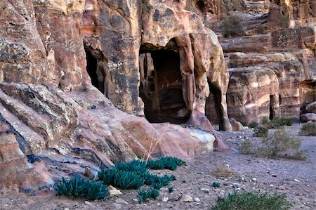 simsearch:400-05132743,k - Hidden small tombs in Petra (small Siq area)- Nabataeans capital city (Al Khazneh) , Jordan. Made by digging a holes in the rocks. Roman Empire period. Photographie de stock - Aubaine LD & Abonnement, Code: 400-05134425