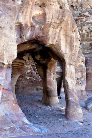 simsearch:400-05132743,k - Hidden small tombs in Petra (small Siq area)- Nabataeans capital city (Al Khazneh) , Jordan. Made by digging a holes in the rocks. Roman Empire period. Photographie de stock - Aubaine LD & Abonnement, Code: 400-05134426