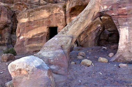simsearch:400-05132743,k - Hidden small tombs in Petra (small Siq area)- Nabataeans capital city (Al Khazneh) , Jordan. Made by digging a holes in the rocks. Roman Empire period. Photographie de stock - Aubaine LD & Abonnement, Code: 400-05134427