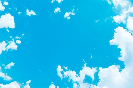 simsearch:400-05663982,k - A photography of a blue summer sky with bright white clouds Photographie de stock - Aubaine LD & Abonnement, Code: 400-05134705