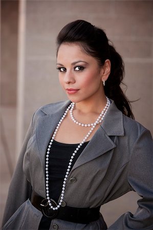 Pretty Hispanic woman in a business suit Stock Photo - Budget Royalty-Free & Subscription, Code: 400-05134848