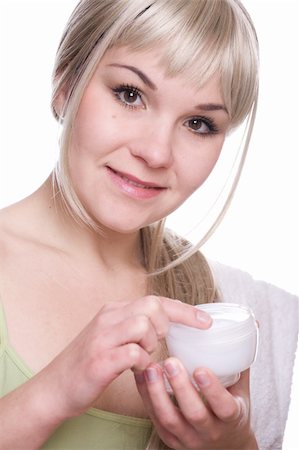 simsearch:400-06131065,k - attractive woman applying cream over white background Stockbilder - Microstock & Abonnement, Bildnummer: 400-05134909