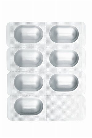 Blister pack containing medical pills isolated on white background. Path included Stock Photo - Budget Royalty-Free & Subscription, Code: 400-05134986