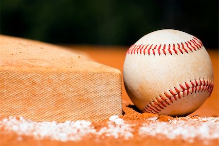 Baseball with a bag in the background with foul line in the foreground Stock Photo - Budget Royalty-Free & Subscription, Code: 400-05135035