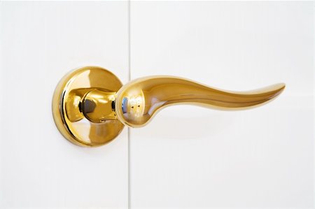 white door with the new shining lock Photographie de stock - Aubaine LD & Abonnement, Code: 400-05135129