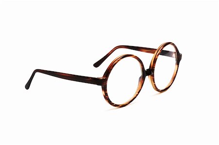 New and modern glasses on a white background Fotografie stock - Microstock e Abbonamento, Codice: 400-05135463
