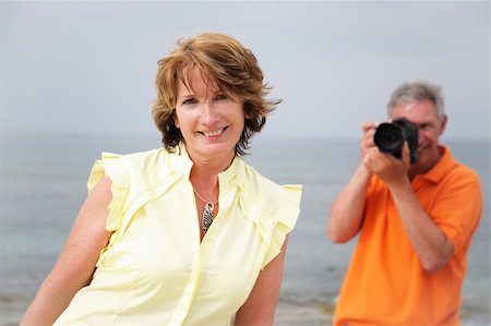 beautiful mature woman posing for her husband's photos Stock Photo - Budget Royalty-Free & Subscription, Code: 400-05136341