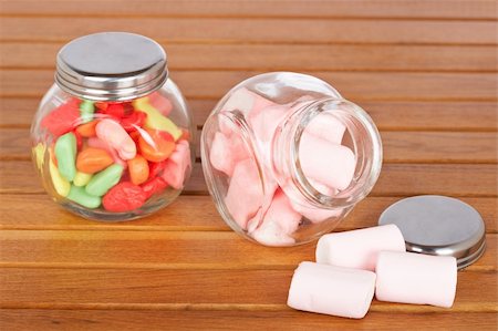 simsearch:400-04781520,k - Colorful candies  and pink marshmallows in the glass jar on wooden background Photographie de stock - Aubaine LD & Abonnement, Code: 400-05136440
