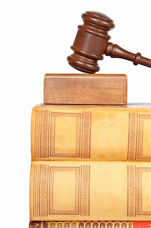 Wooden gavel from the court and law books isolated on white background. Shallow depth of field Foto de stock - Super Valor sin royalties y Suscripción, Código: 400-05136441