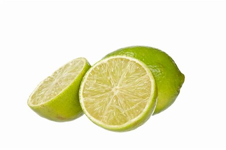 simsearch:400-04395073,k - A fresh lime isolated on white background. Shallow depth of field Stock Photo - Budget Royalty-Free & Subscription, Code: 400-05136460