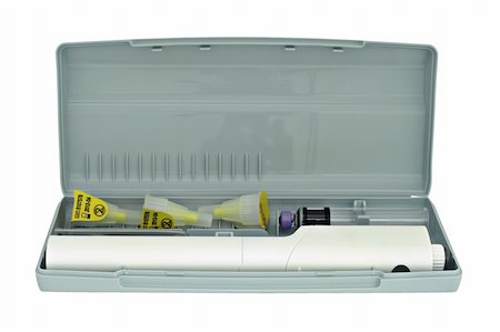 excitator (artist) - Insulin pen, compact case, disposable needles, close-up Foto de stock - Super Valor sin royalties y Suscripción, Código: 400-05136491