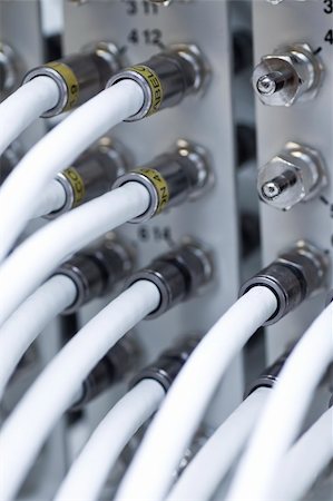 Network cable connected to a switch (selective focus) Stock Photo - Budget Royalty-Free & Subscription, Code: 400-05137121
