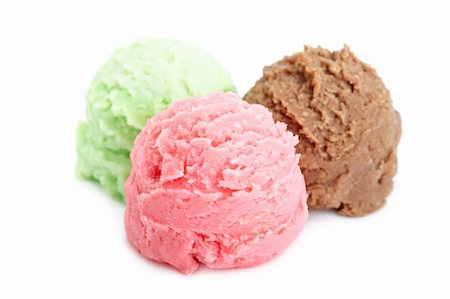 Three balls of multi flavor ice cream isolated on white background. Shallow depth of field Stock Photo - Budget Royalty-Free & Subscription, Code: 400-05137512