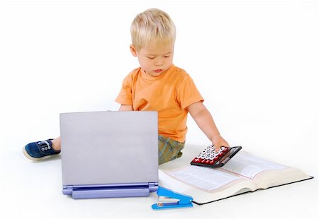 simsearch:400-04129482,k - Child on floor with a calculator Photographie de stock - Aubaine LD & Abonnement, Code: 400-05137585