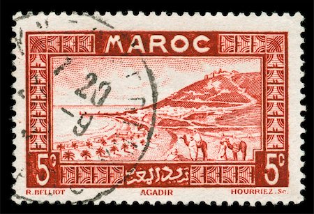 vintage stamp from Morocco depicting a traditional scenic view with camel riders Stock Photo - Budget Royalty-Free & Subscription, Code: 400-05137758