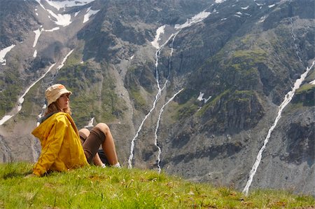 woman in mountains and see on high peak Photographie de stock - Aubaine LD & Abonnement, Code: 400-05137779