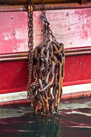 european rimming closeup - chain hanging over bow ship Stock Photo - Budget Royalty-Free & Subscription, Code: 400-05138431