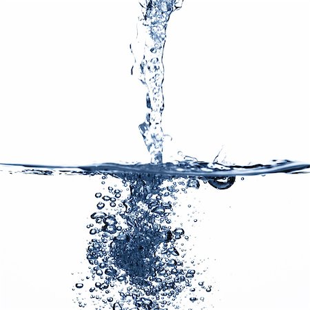Crisp, clear, refreshing water against a white background. Fotografie stock - Microstock e Abbonamento, Codice: 400-05139014